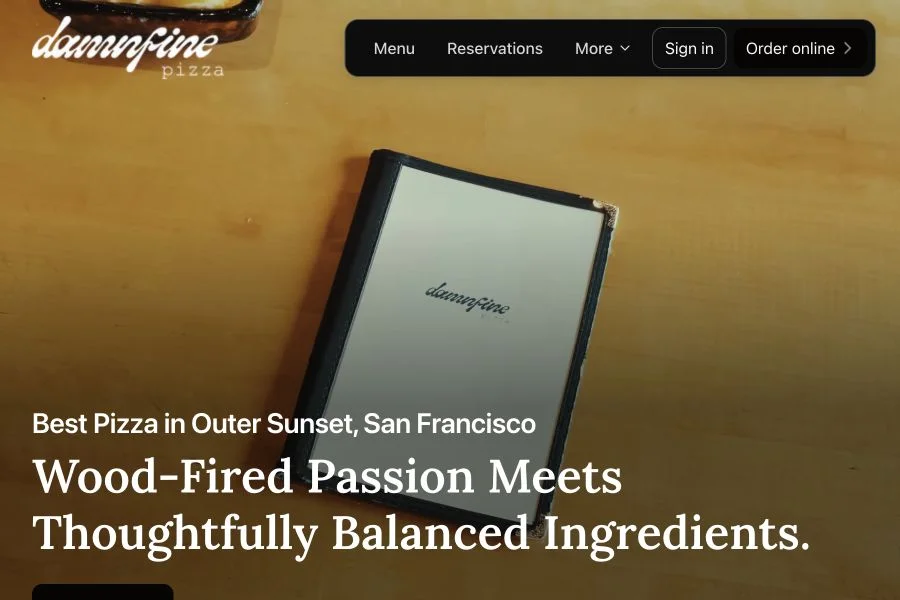 Damn Fine Pizza’s homepage, featuring its logo and wood-fired pizza headline